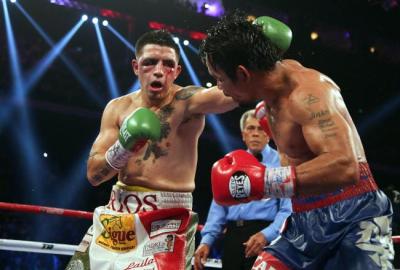 Nearing the end, Rios' eyes could hardly see. (Photo by bleacherreport.com)