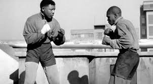 Mandela showing off his boxing skills.