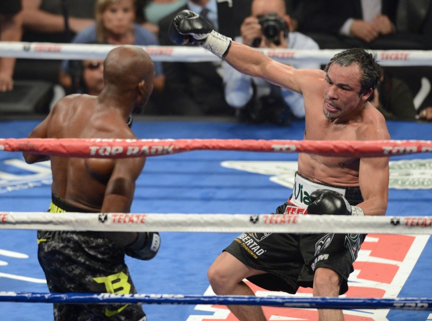 Tim tags JuanMa in an exciting tactical exchange between elite boxing icons. (From craveonline.com)