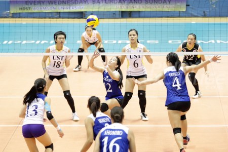 Ateneo's Julia Morado sets the ball against UST. (Photo by Mark Cristino.)