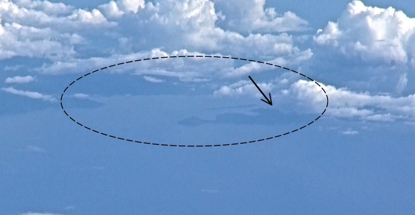 Oyster Bay (arrow) within Ulugan Bay (oval), Palawan. Photo by Victor Robert Lee.