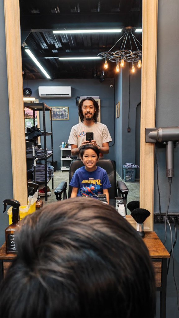 Buchi reenacts my barbaric barber episode. 